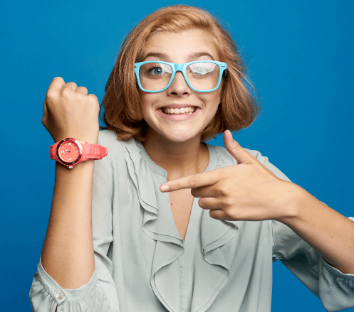Girl Showing A Watch With Blue Glasses Frame