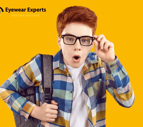 Boy With Red Hairs Wear A Glasses