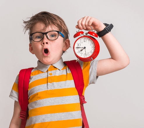 Children Holds A Alarm Clock