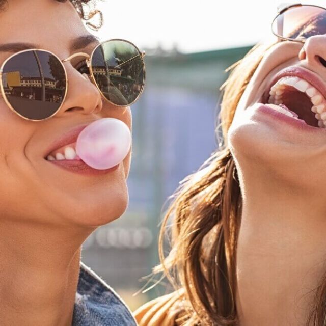 Two Girls Enjoy The Party With Sun Glasses