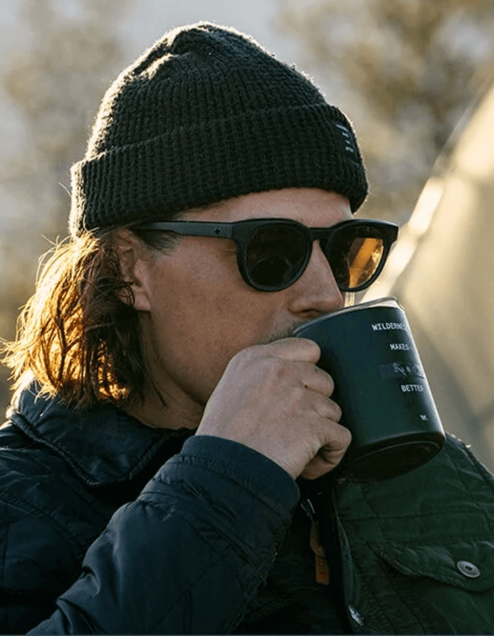 Men Hold A Cup Of Coffee