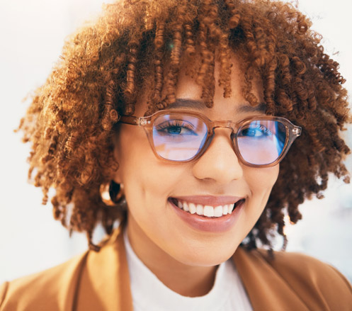 Woman Smile With Brown Hairs And Brown Glasses